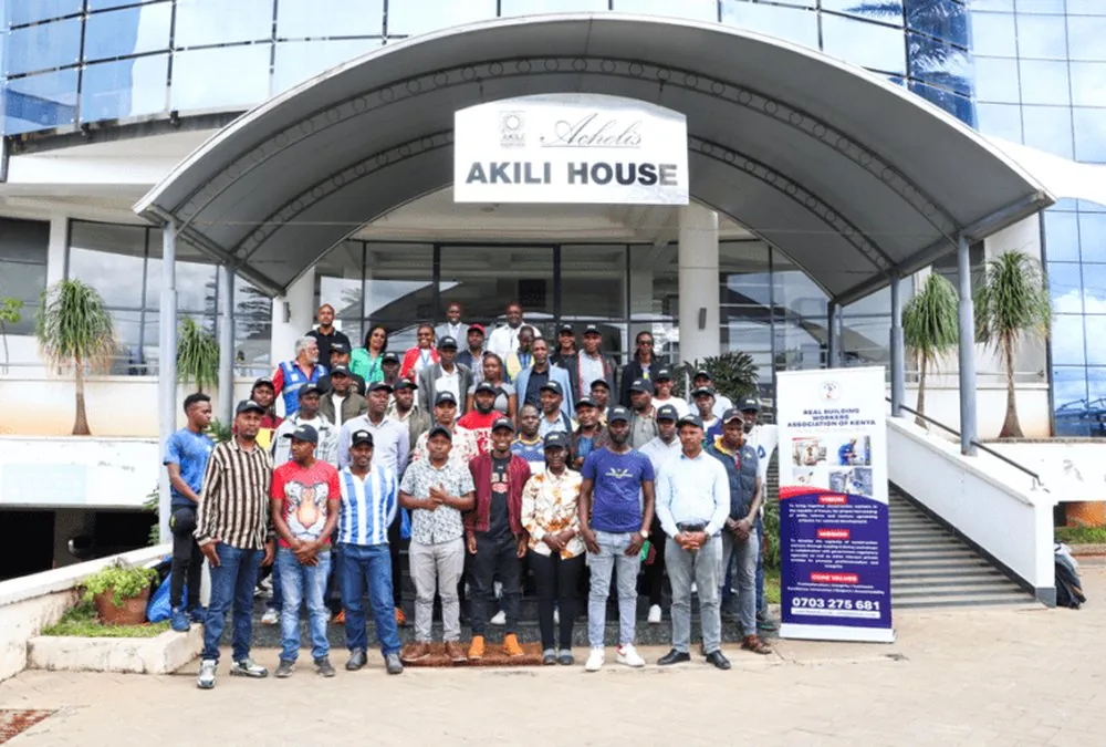 REBWAK members outside Akili House at the machine operators forum