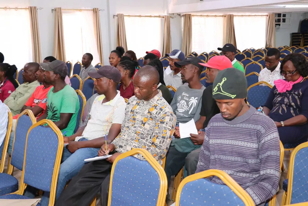 Participants taking notes at the Ruiru Municipality Construction Conference